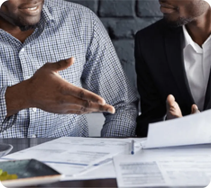 Consultant reviewing documents with a client