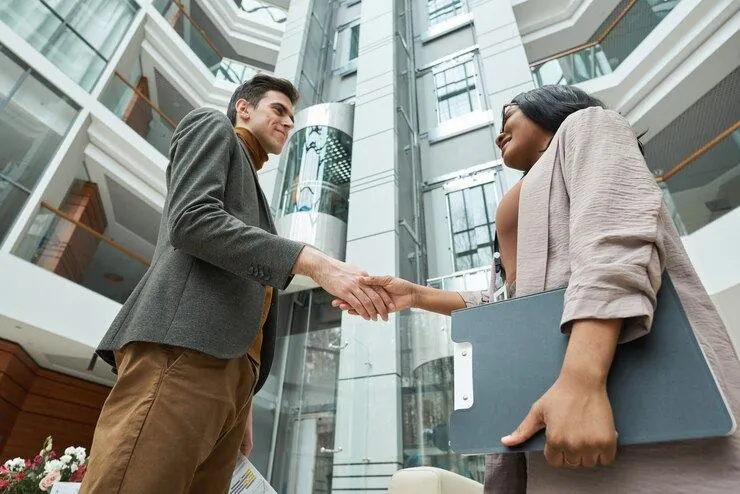 Joint venture partners shaking hands